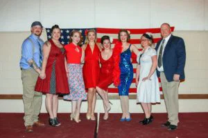 Pin-Ups on Tour posing with Operation Creation founder and Best Dressed winners
